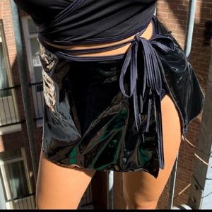Ravewithmigente vortex wrap mini skirt